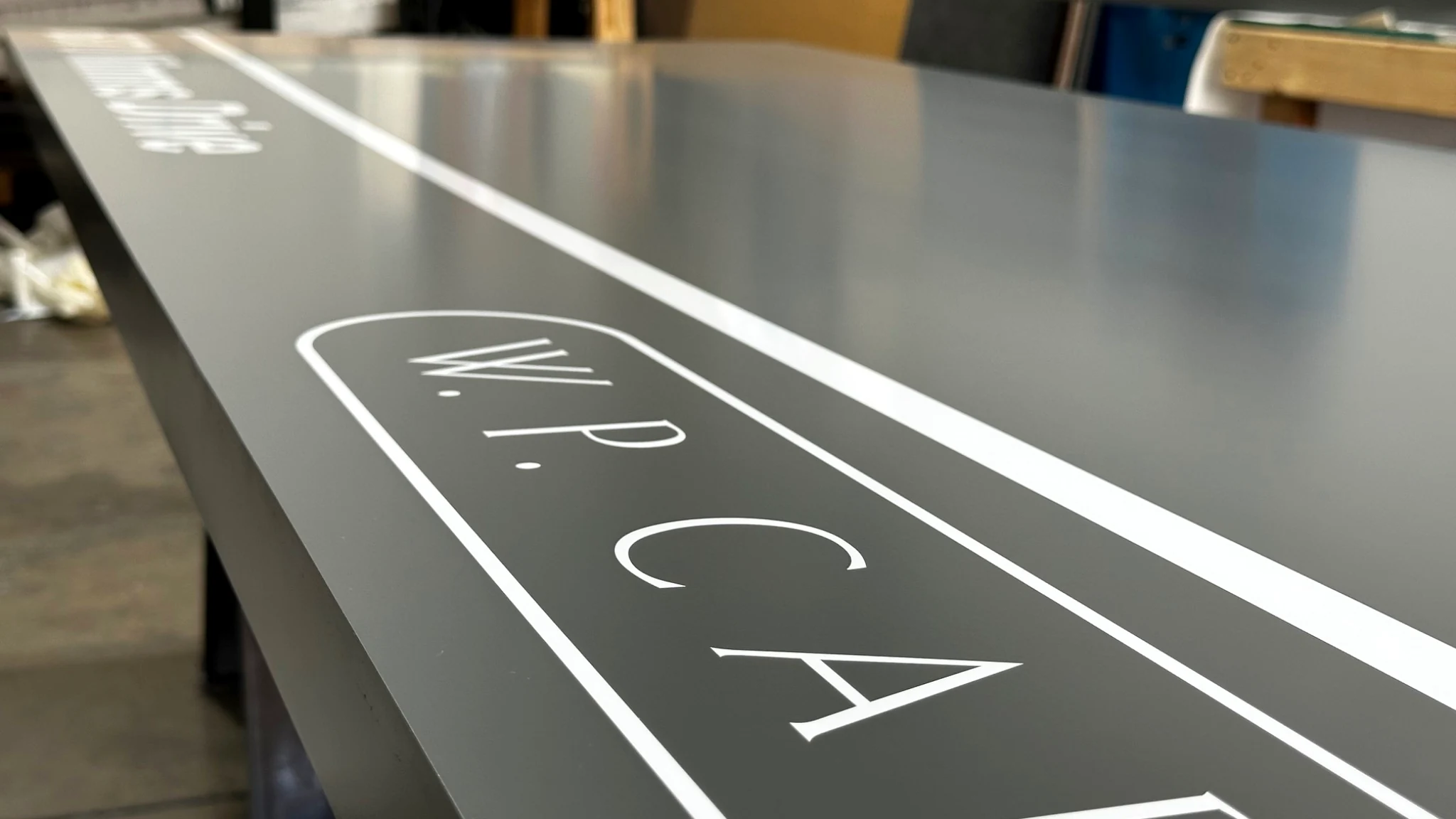 Close-up showing detailed sign finish and material edges